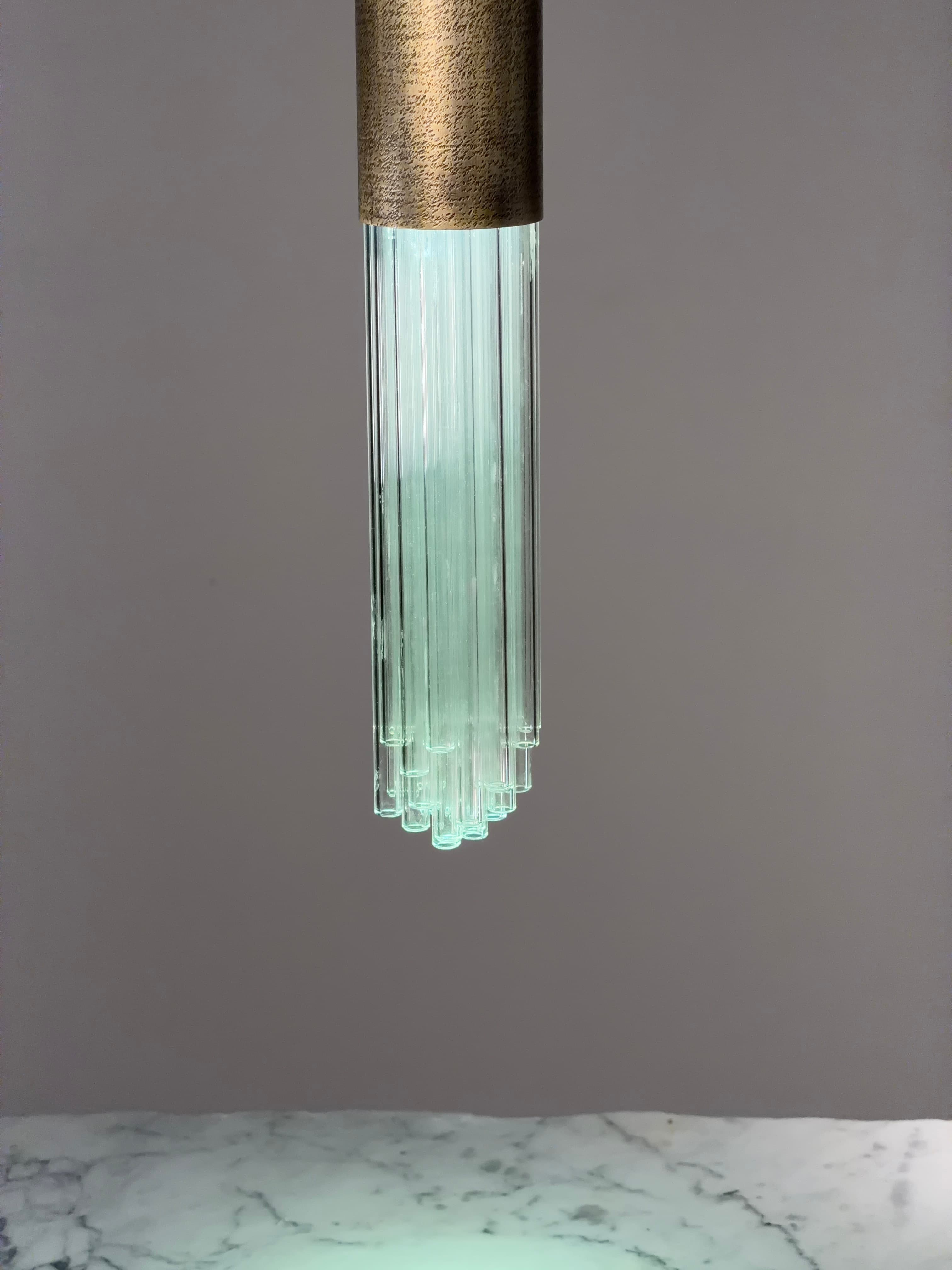 Glass straws and textured metal construction detail